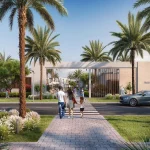 Modern gated community entrance archway with palm trees and pedestrian walkway at Urbana I in Emaar South Dubai