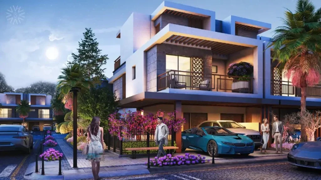 Contemporary 4 bedroom townhouse facade with covered carport and lush landscaping at Violet 3 in DAMAC Hills 2, Dubai