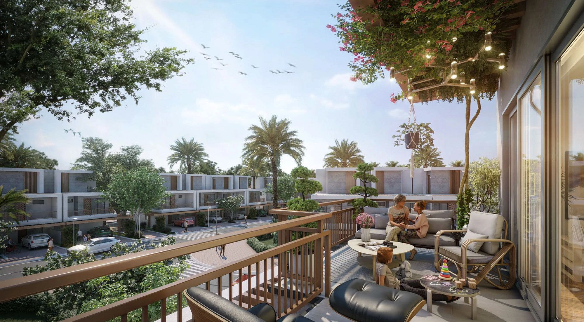Spacious private townhouse balcony with outdoor seating overlooking green community views at Violet 3 in DAMAC Hills 2, Dubai