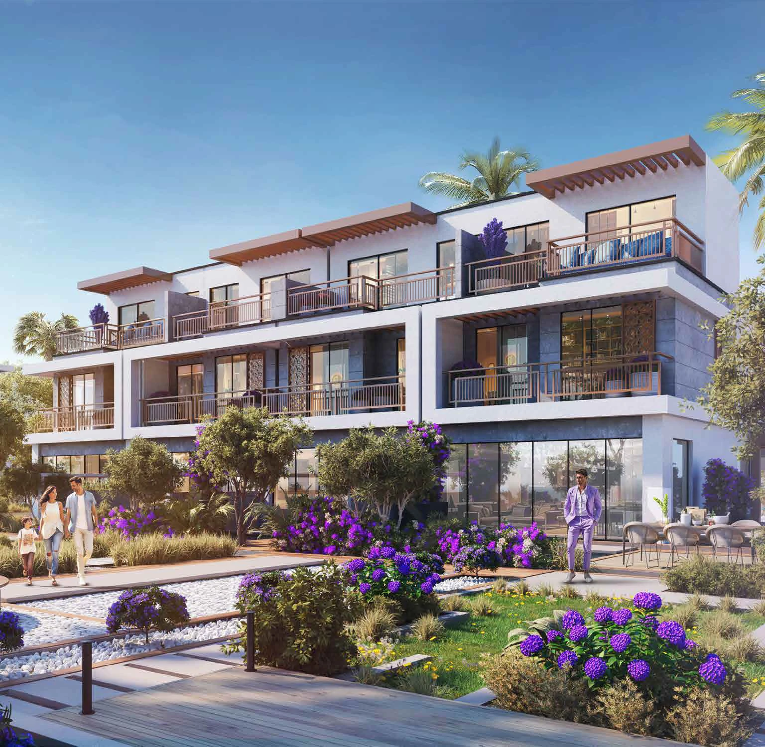 Townhouse backyard garden featuring private swimming pool, outdoor seating, and poolside deck at Violet 3 in DAMAC Hills 2, Dubai