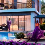 Townhouse backyard garden featuring private swimming pool, outdoor seating, and poolside deck at Violet 3 in DAMAC Hills 2, Dubai