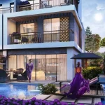 Luxury 4 bedroom townhouse exterior featuring private swimming pool, patio dining, and lush floral garden at Violet 3 in DAMAC Hills 2, Dubai