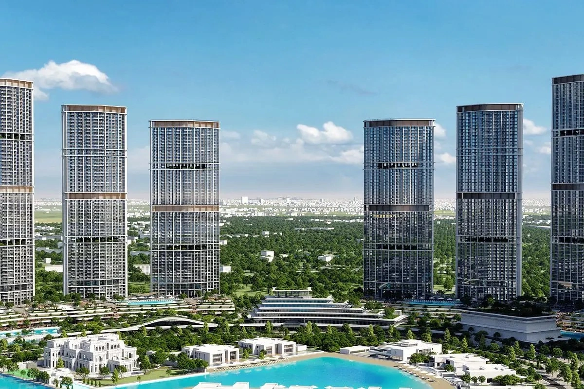 Panoramic view of high-rise residential towers surrounded by lush greenery at 350 Riverside Crescent, Sobha Hartland II, Dubai