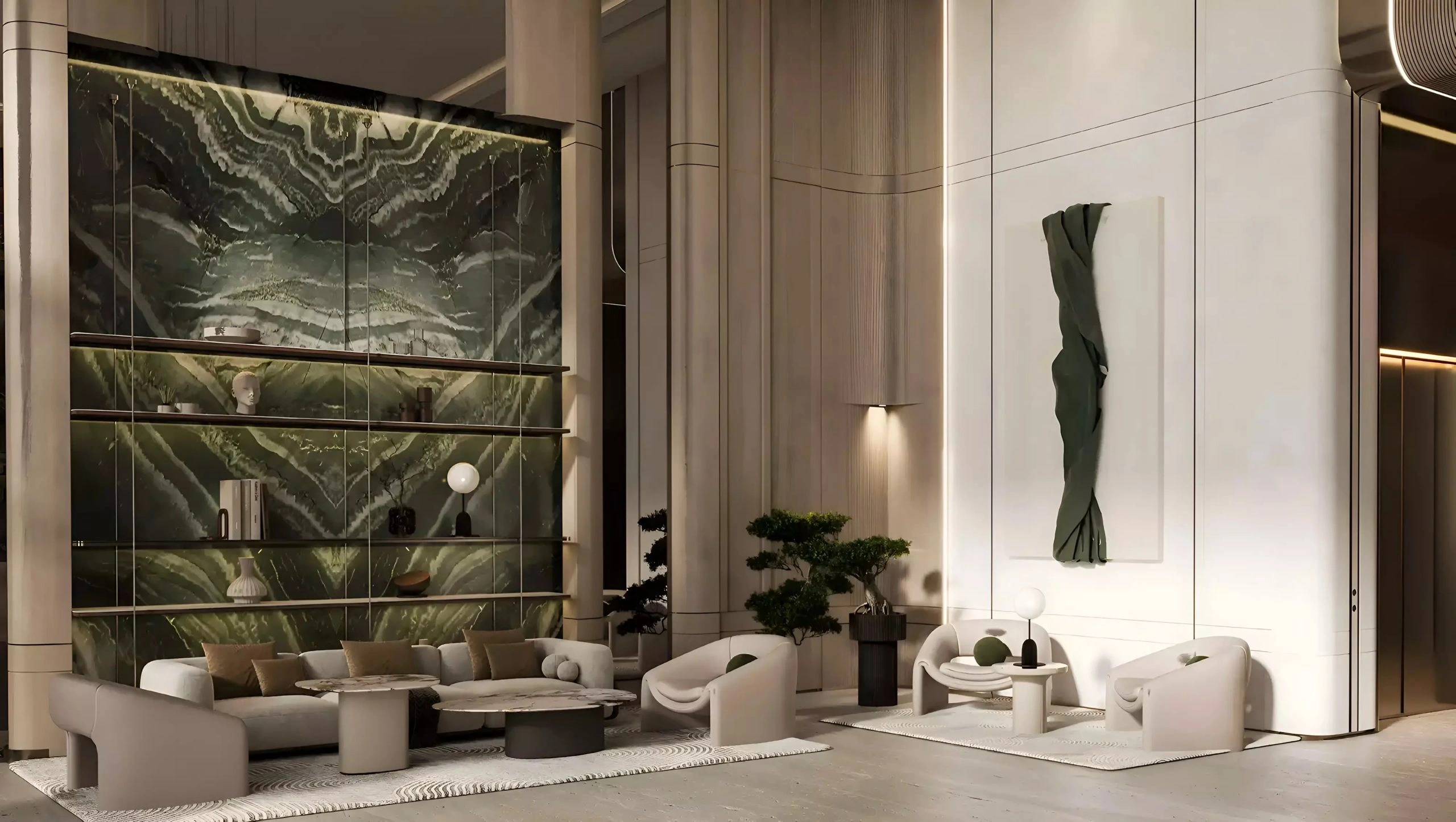 Modern residential entrance lobby with marble feature wall and luxury seating area at Binghatti Amberhall in Jumeirah Village Circle, Dubai